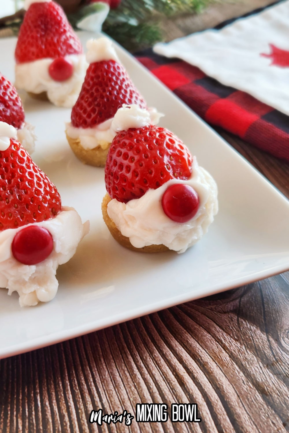 santa gnome cookie cups on a white platter