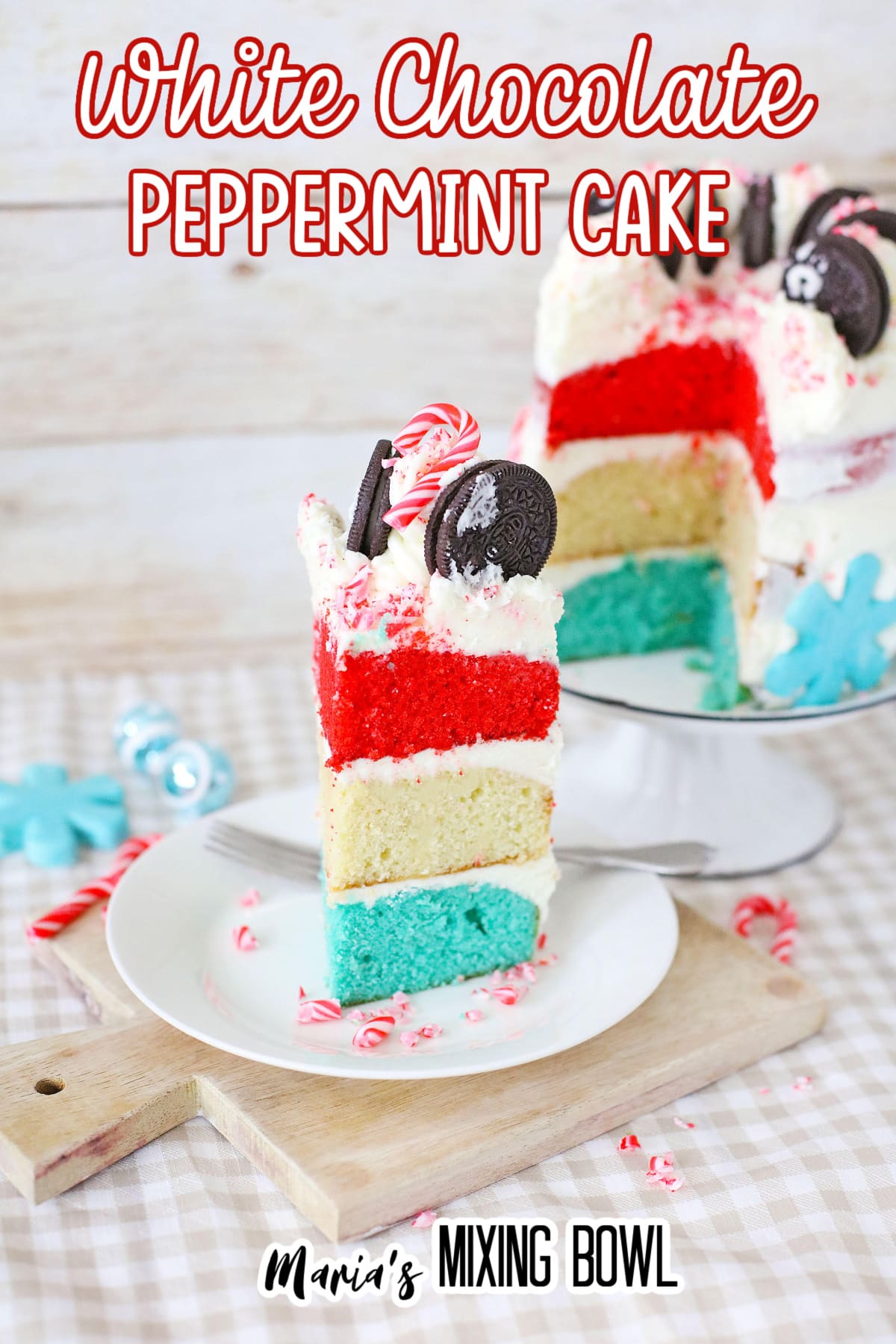 slice of white chocolate peppermint cake on a white plate