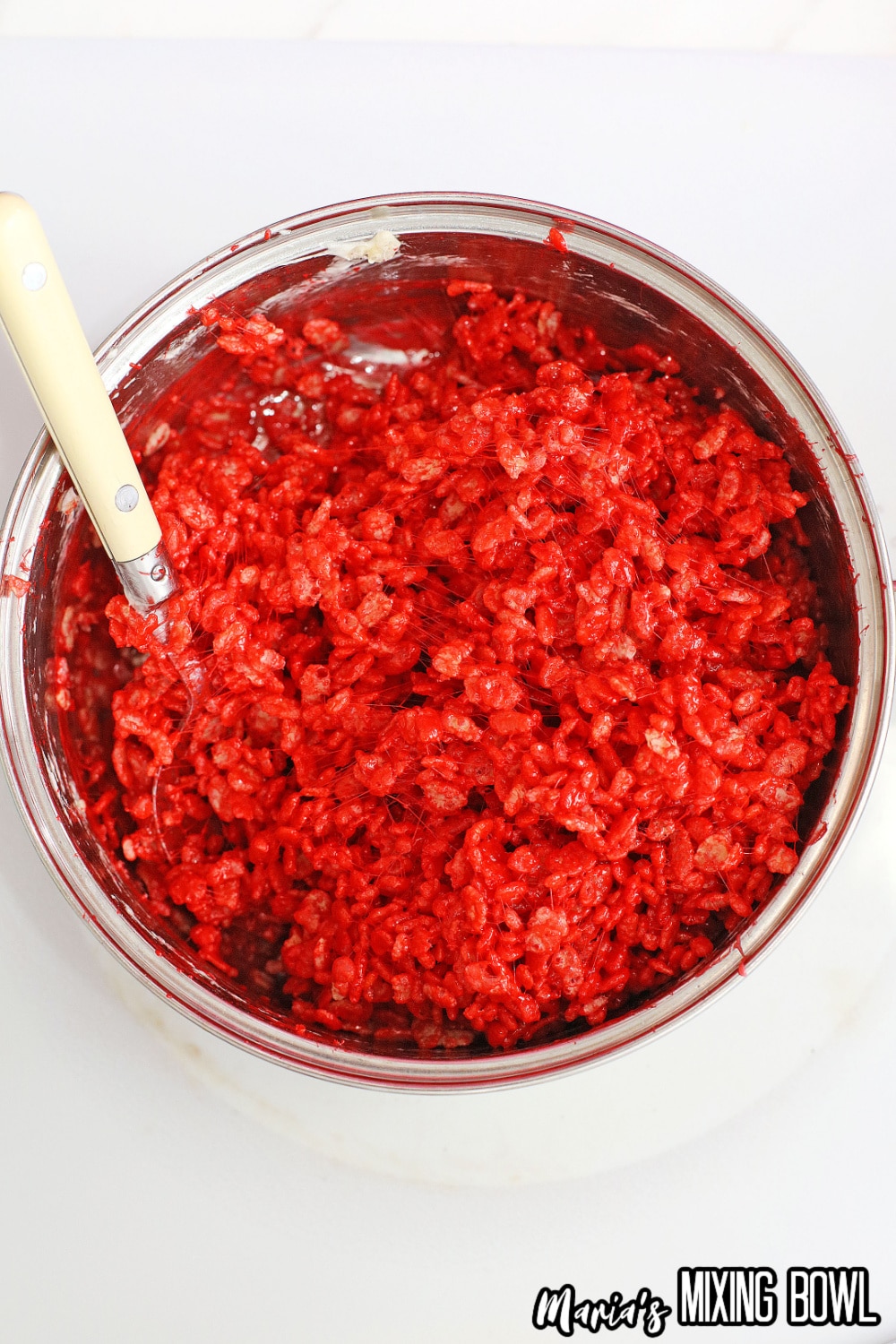 red rice krispies on a stainless steel pot