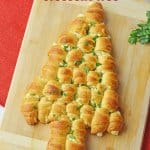 bousin crescent tree on a wooden cutting board with the name in text for pinterest
