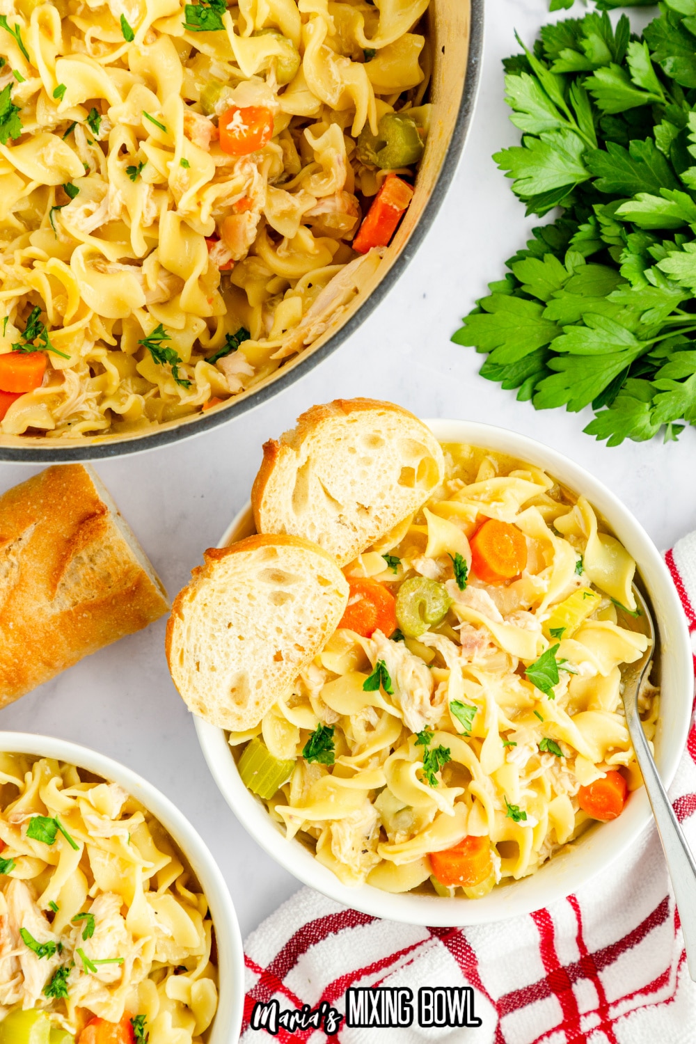 two bowls filled with cafeteria noodles with the name