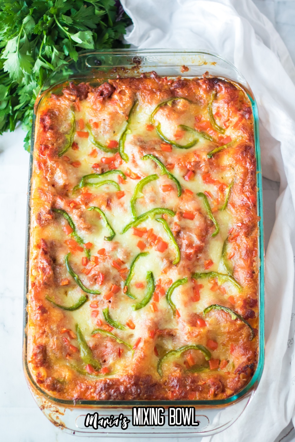 uncut christmas lasagna in a glass casserole dish