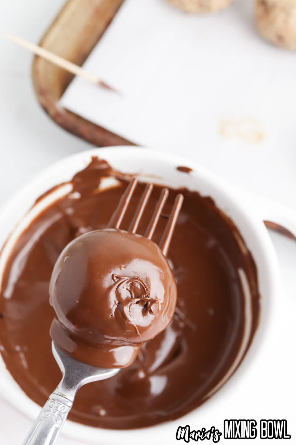cookie dough dipped into melted chocolate