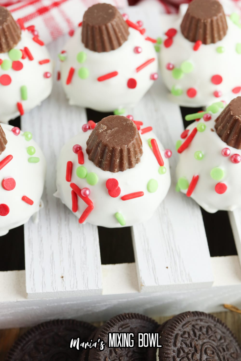 christmas oreo balls on a whtie background
