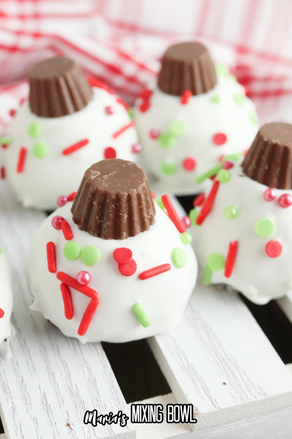 christmas oreo balls on a whtie background