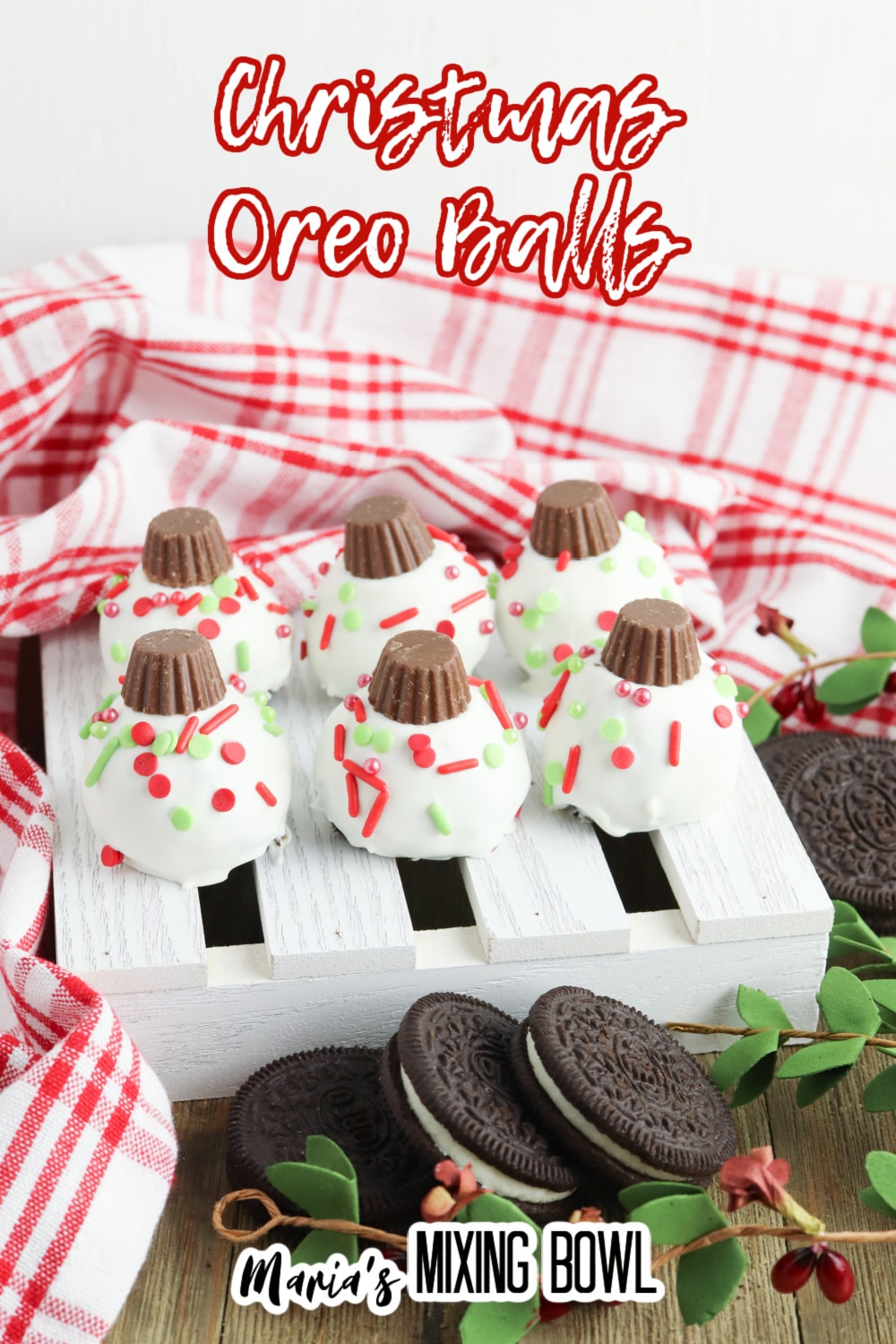 six christmas oreo balls on a white mini wooden pallet with the name in text for pinterest