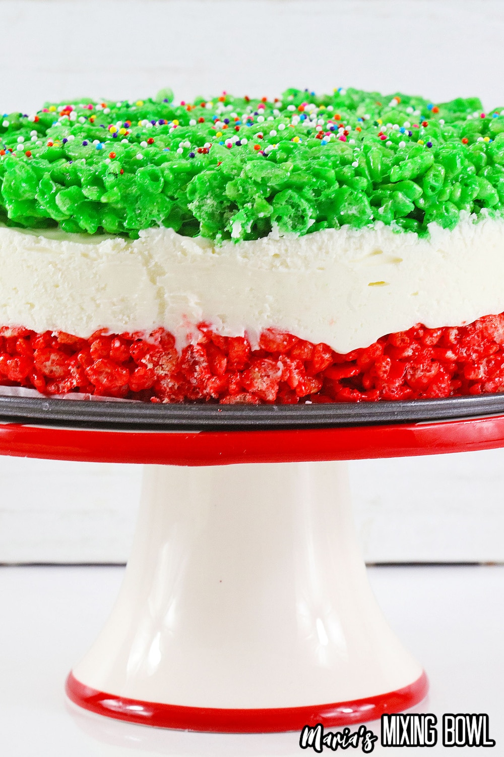 uncut cheesecake on a cake stand
