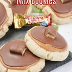 stack of twix cookies on a wooden board with the name in text for pinterest