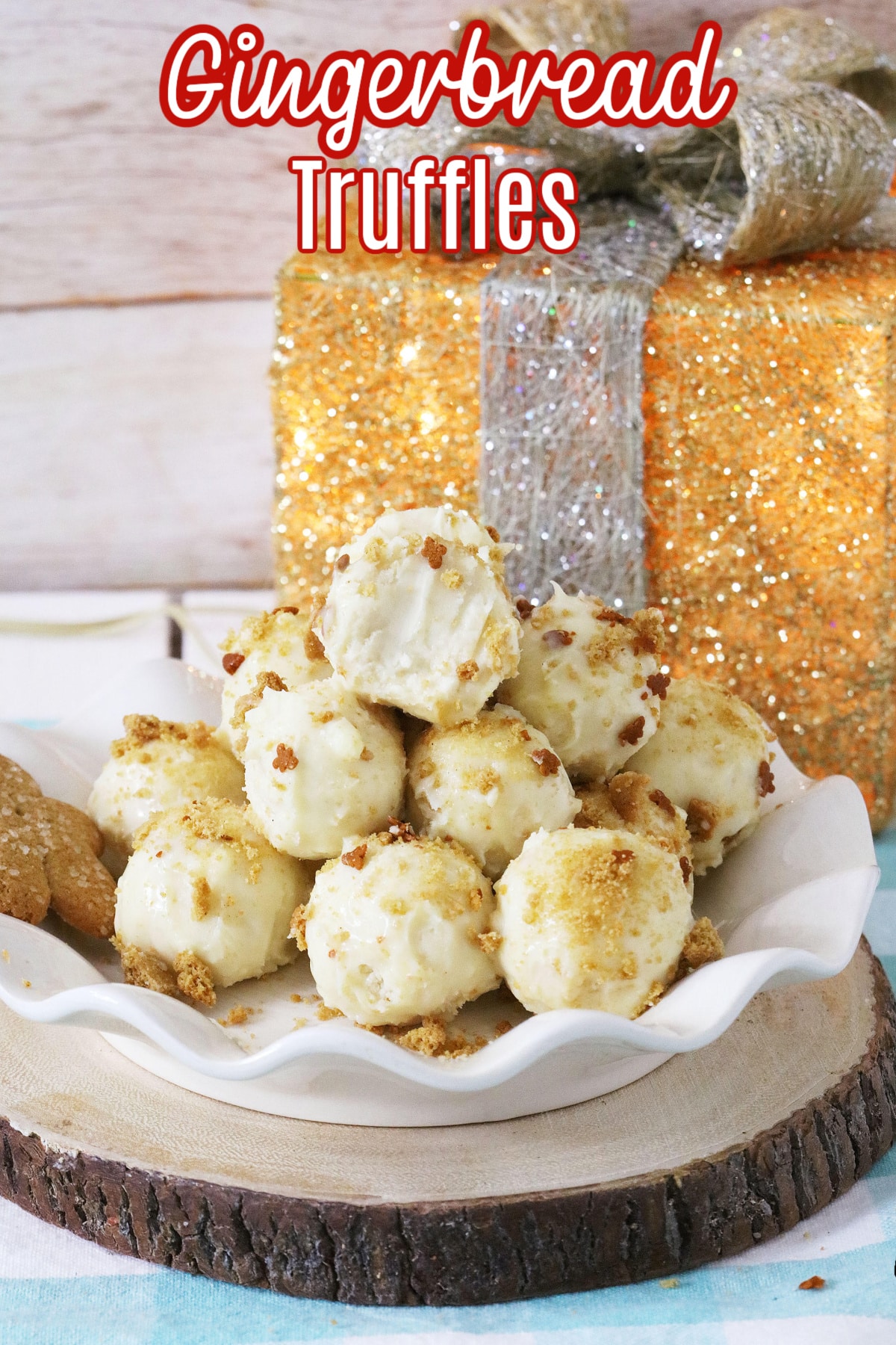 stack of gingerbread truffles on a white scalloped plate with the name in text for pinterest