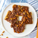 four pieces of graham cracker toffee bark on a white plate with the name in text for pinterest
