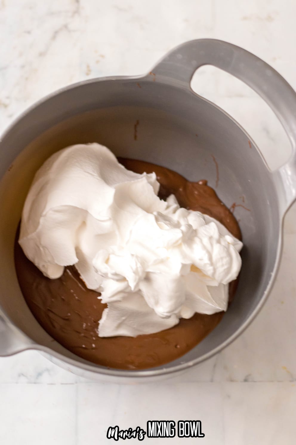 chocolate and cool whip in a large mixing bowl