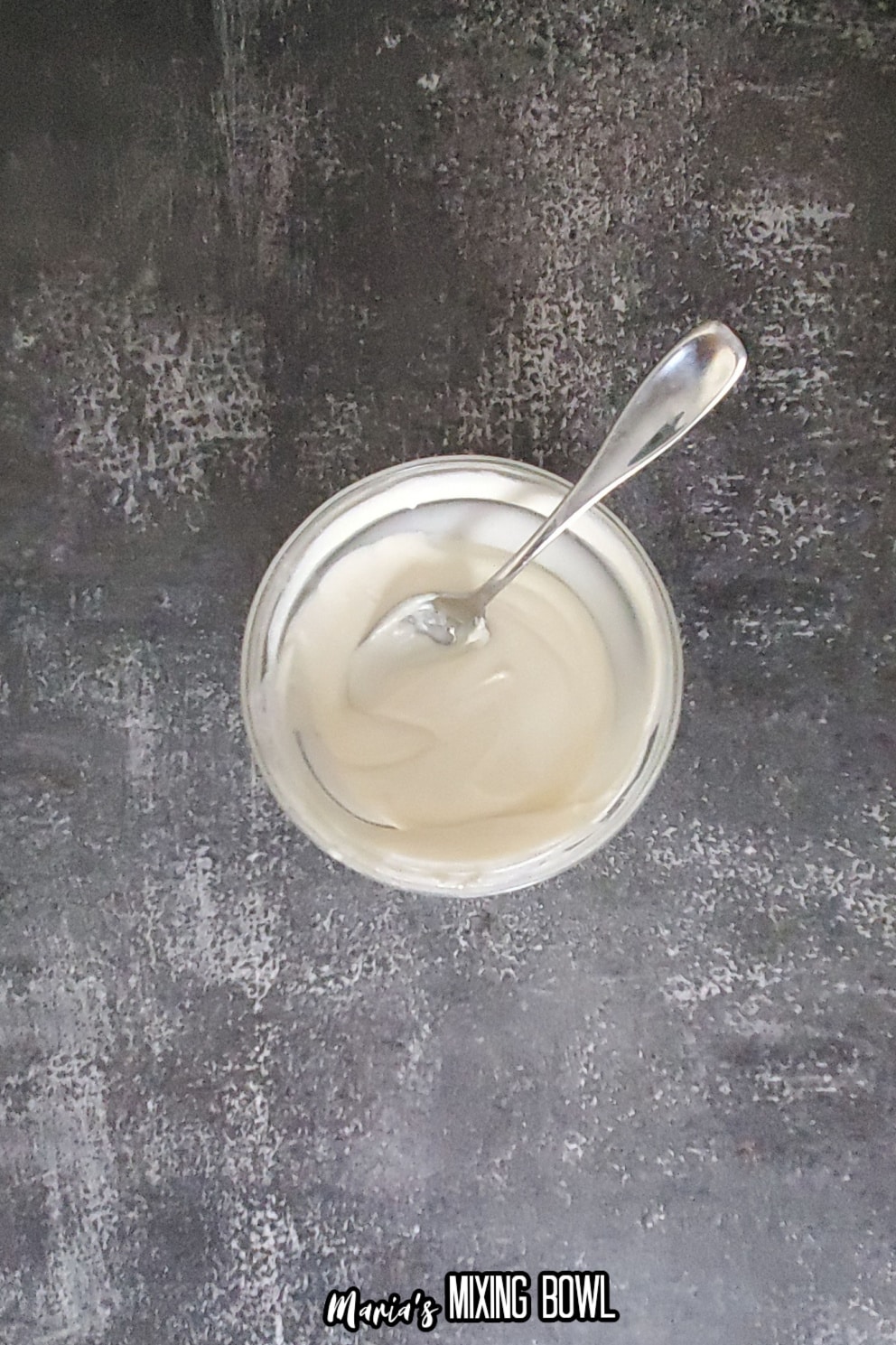 melted white chocolate in a glass bowl