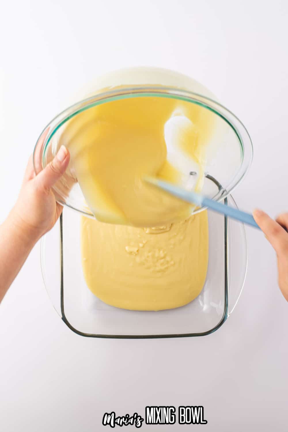 batter being poured into a 9x9 baking dish