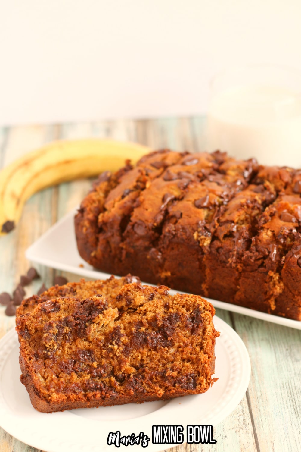 slice of chocolate chip banana bread on a white plate