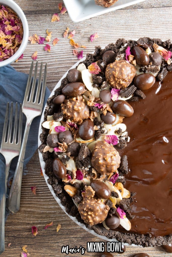 close up of half of a chocolate ganache tart