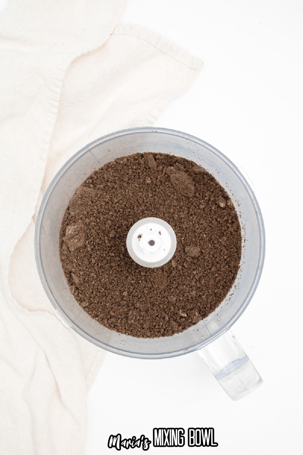 cookies being crushed in a food processor