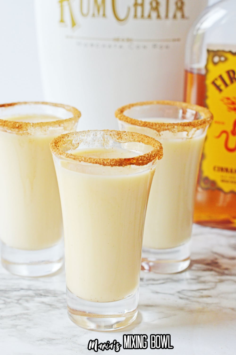 cinnamon toast crunch shots on a marble background