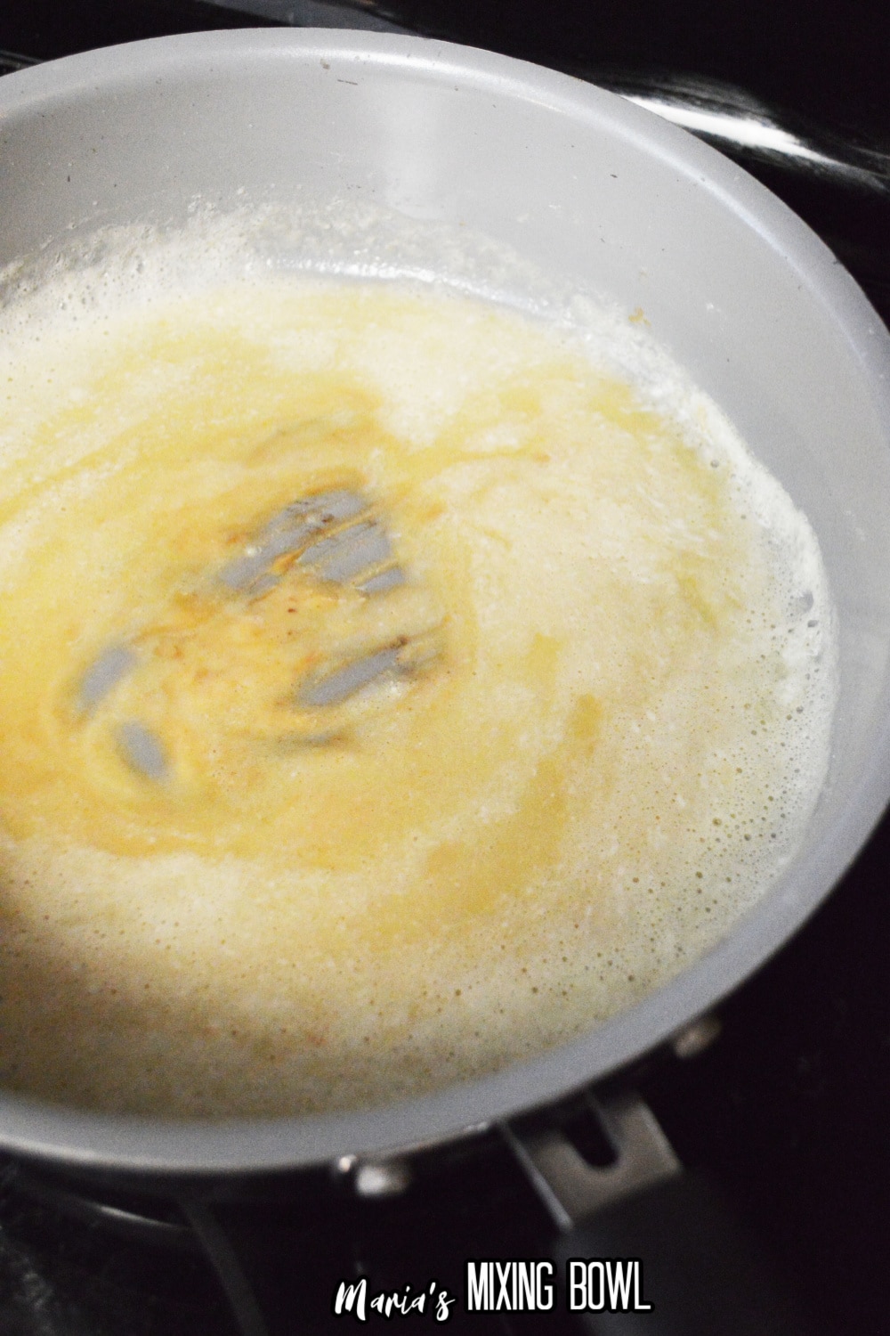 roux being made in a skillet on the stove