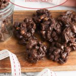 Crockpot Turtle Candy on a wooden cutting board with the name in text for pinterest