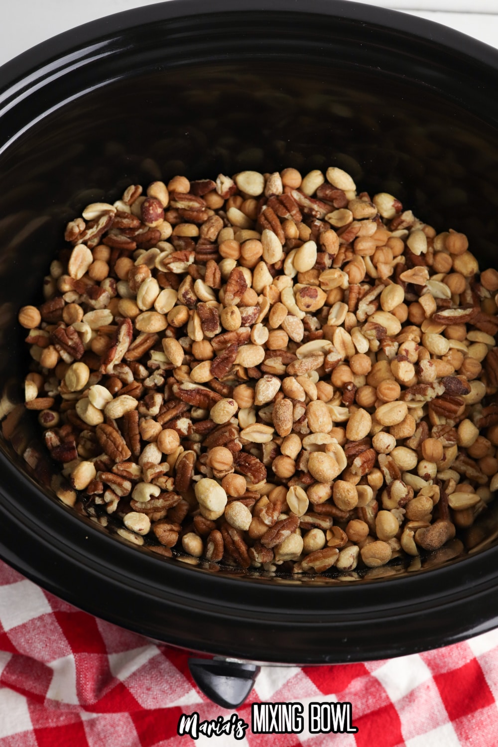 pecans, pecans and chocolate in a slow cooker