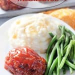 mini meatloaf, mashed potatoes, and green beans on a white plate with the name in text for pinterest