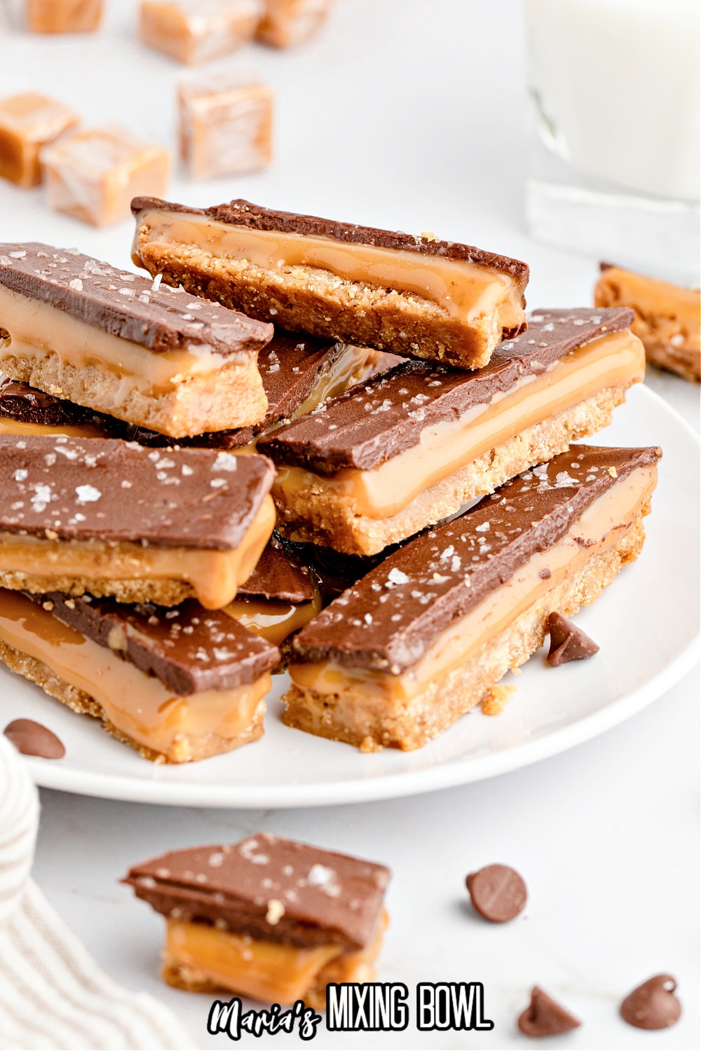 stack of salted caramel chocolate bars on a white plate