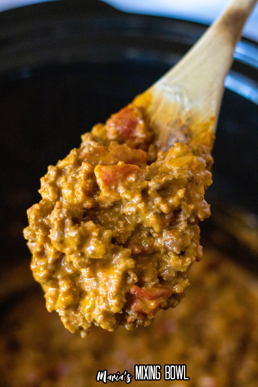 wooden spoon full of slow cooker mexican sloppy joes