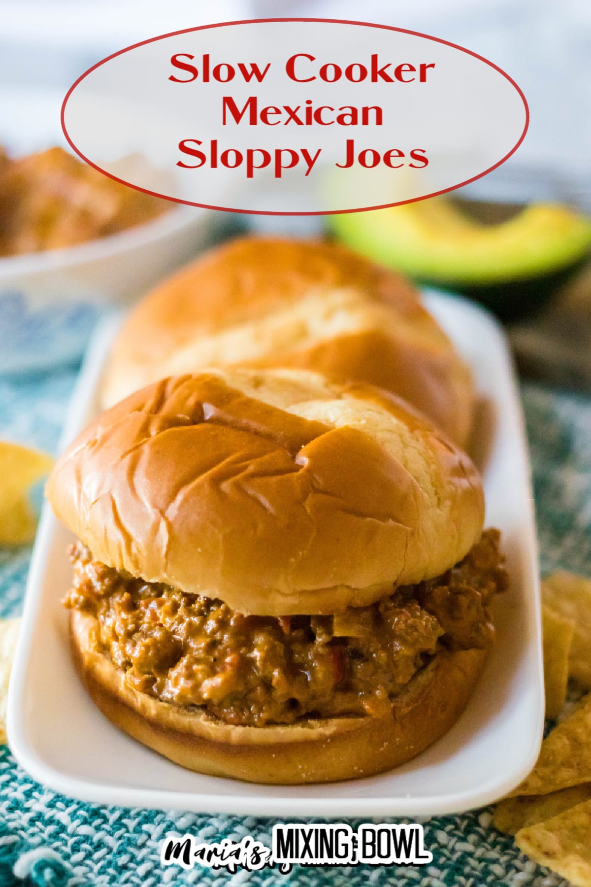 close up of a slow cooker mexican sloppy joes on a white platter with the name in text for pinterest