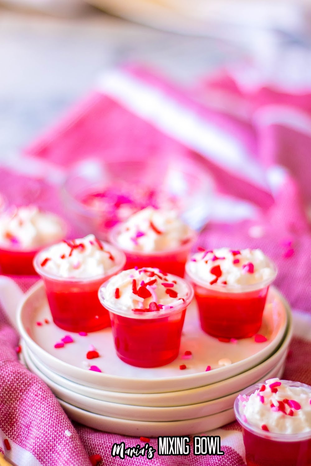four valentine's day jello shorts on a white plate