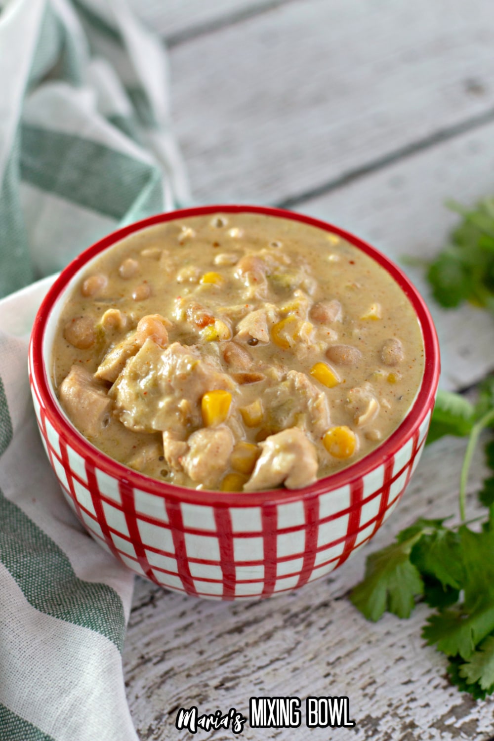 small bowl of white chicken chili with parsley