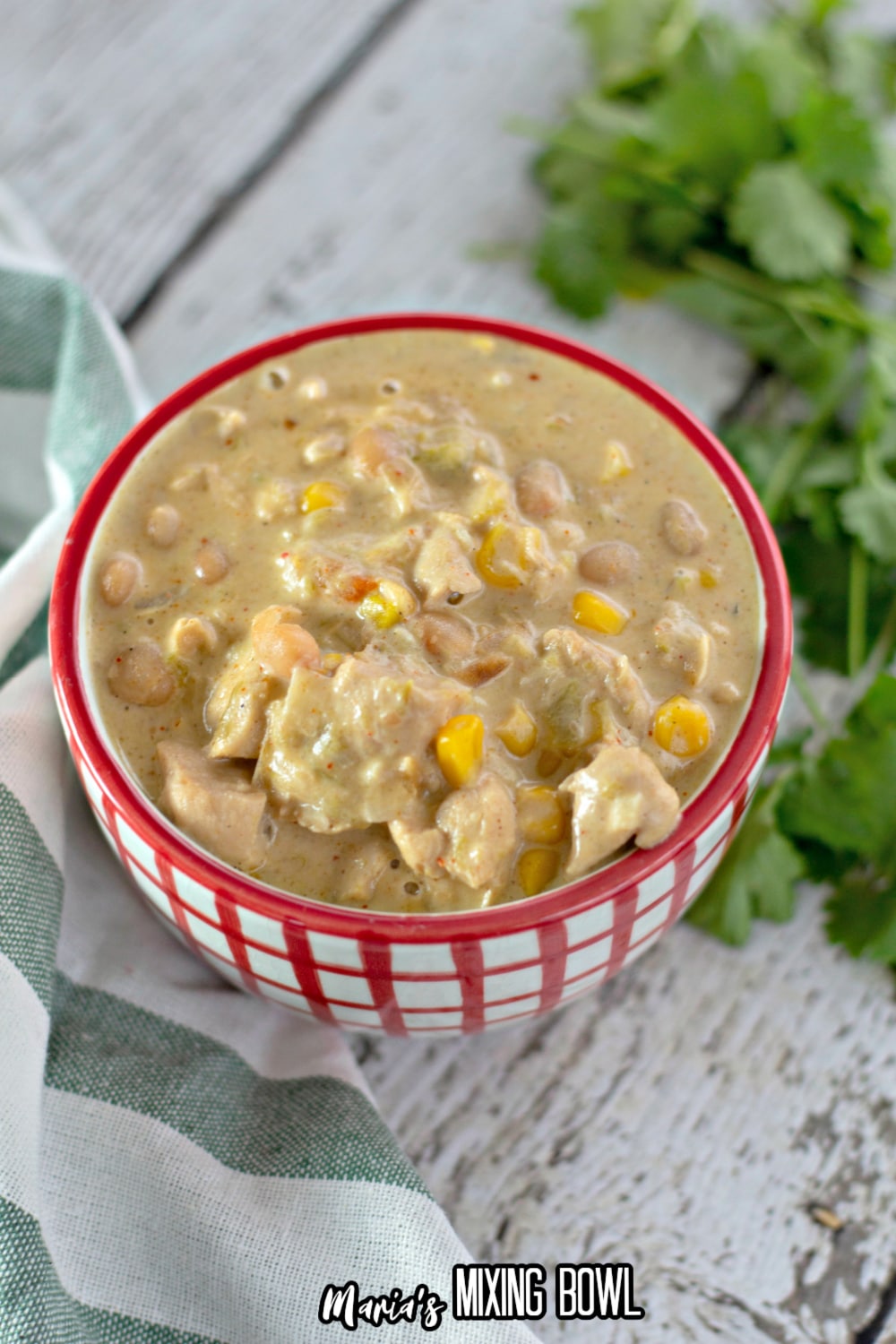 small bowl of white chicken chili with parsley