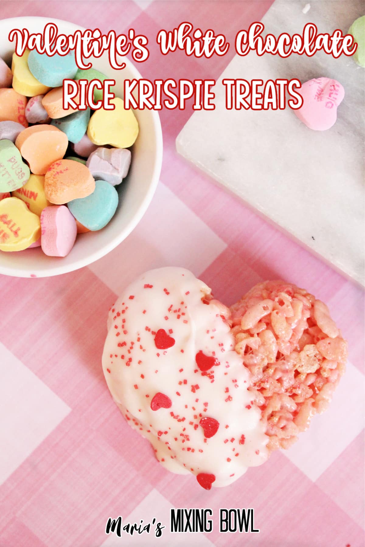 white chocolate dipped rice krispie treat on a pink and white tablecloth with the name in text for pinterest