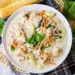 white bowl filled with slow cooker gnocchi soup