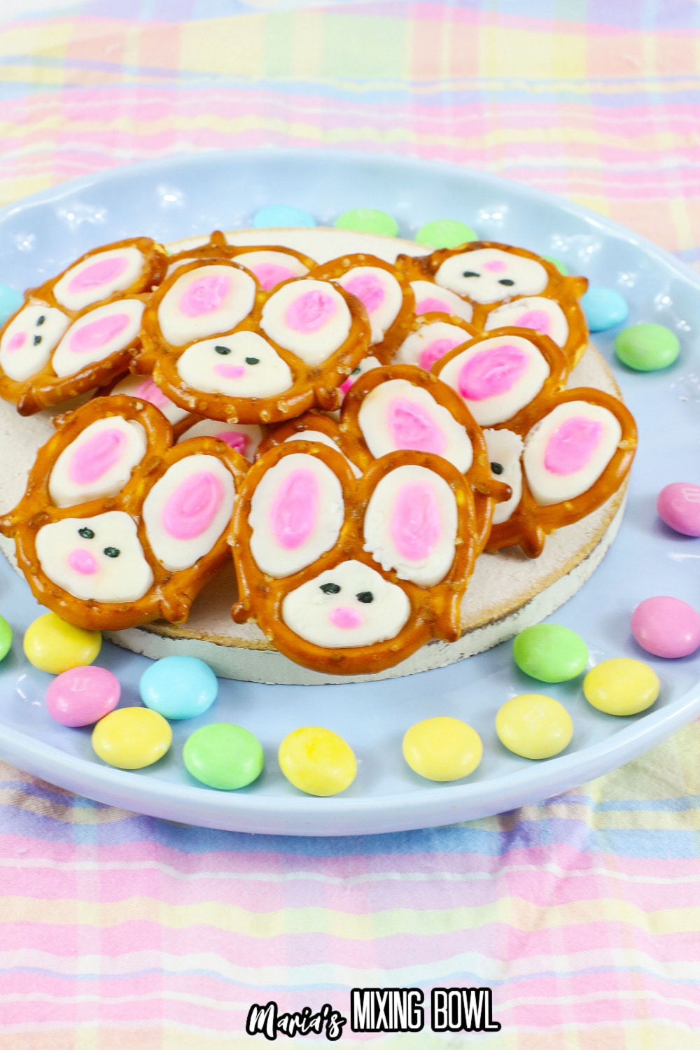 bunny pretzels stacked on a light blue plate