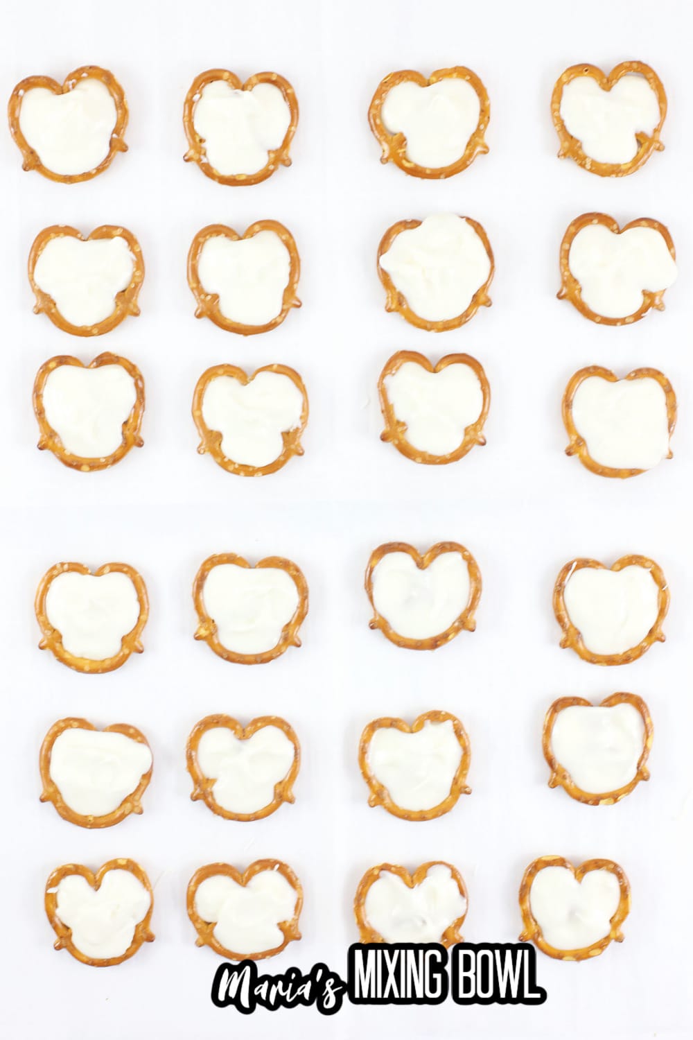 white chocolate being poured into pretzels