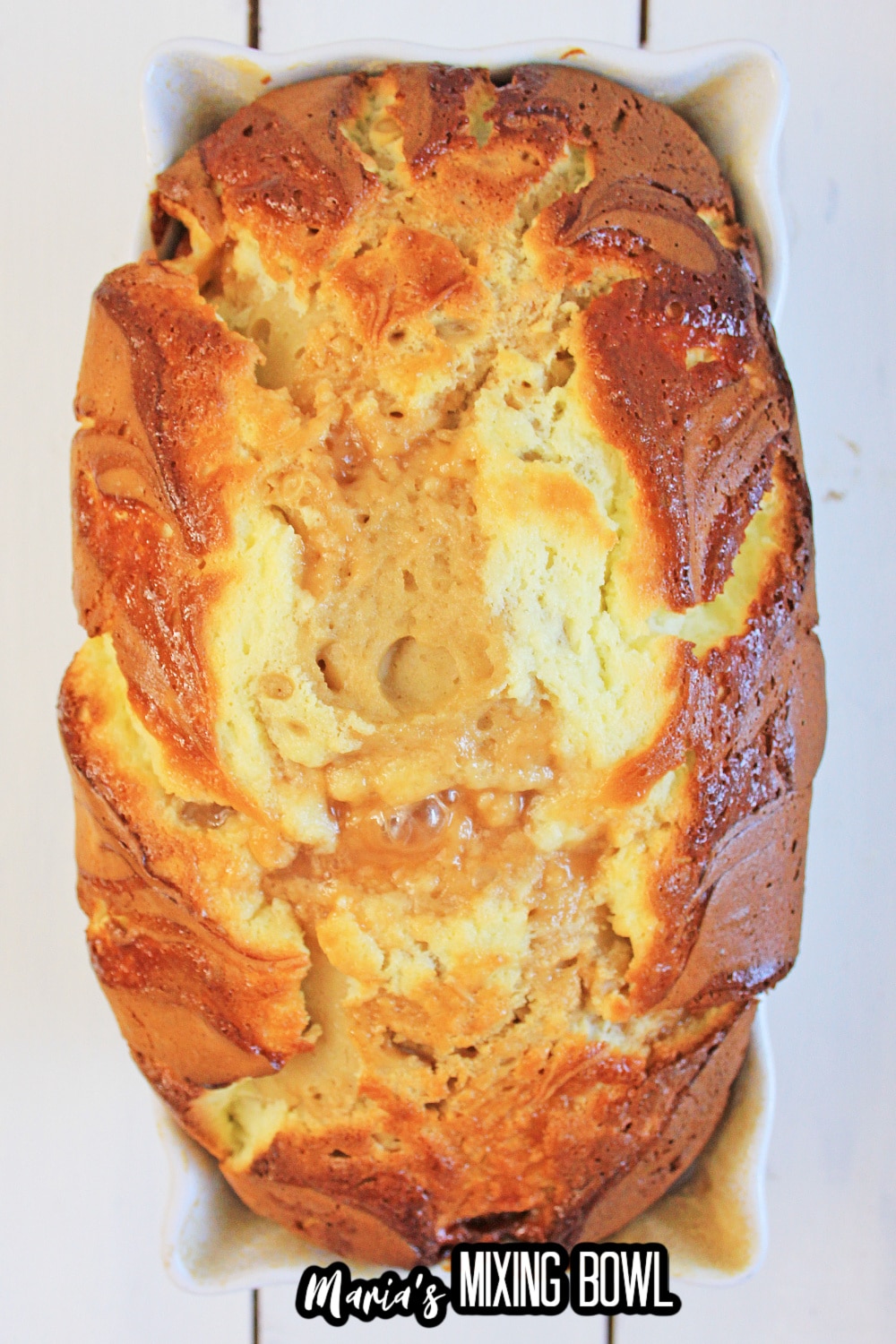 baked load of caramel bread in a white baking dish