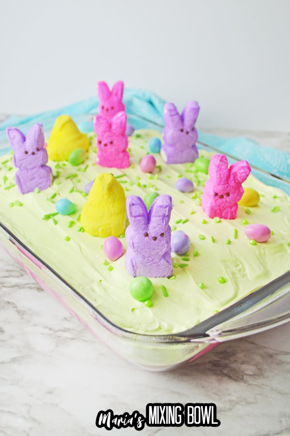 uncut easter poke cake in a glass baking dish