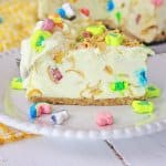 slice of lucky charms cheesecake on a white plate