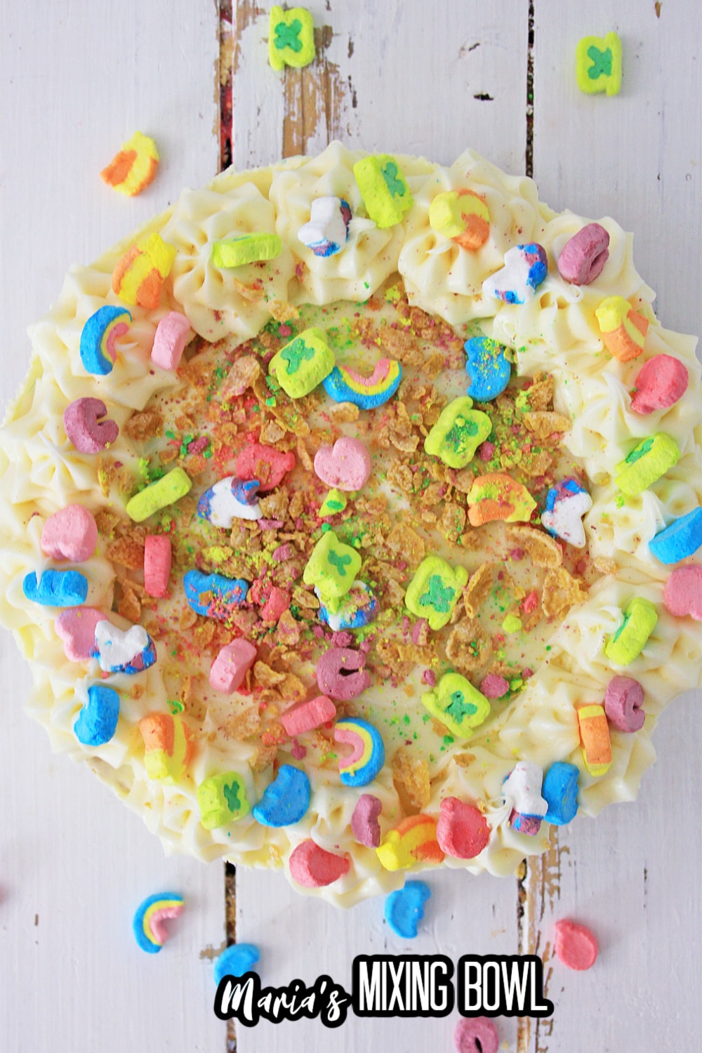 whole lucky charms cheesecake on a wooden background