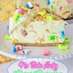 slice of lucky charms cheesecake on a white plate