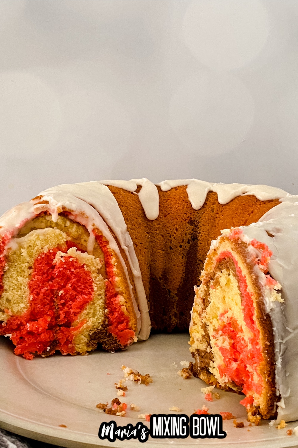 cut neapolitan pound cake on a white plate