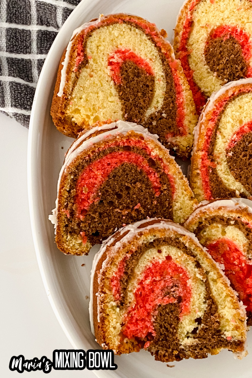 slices of Neapolitan pound cake on white platter