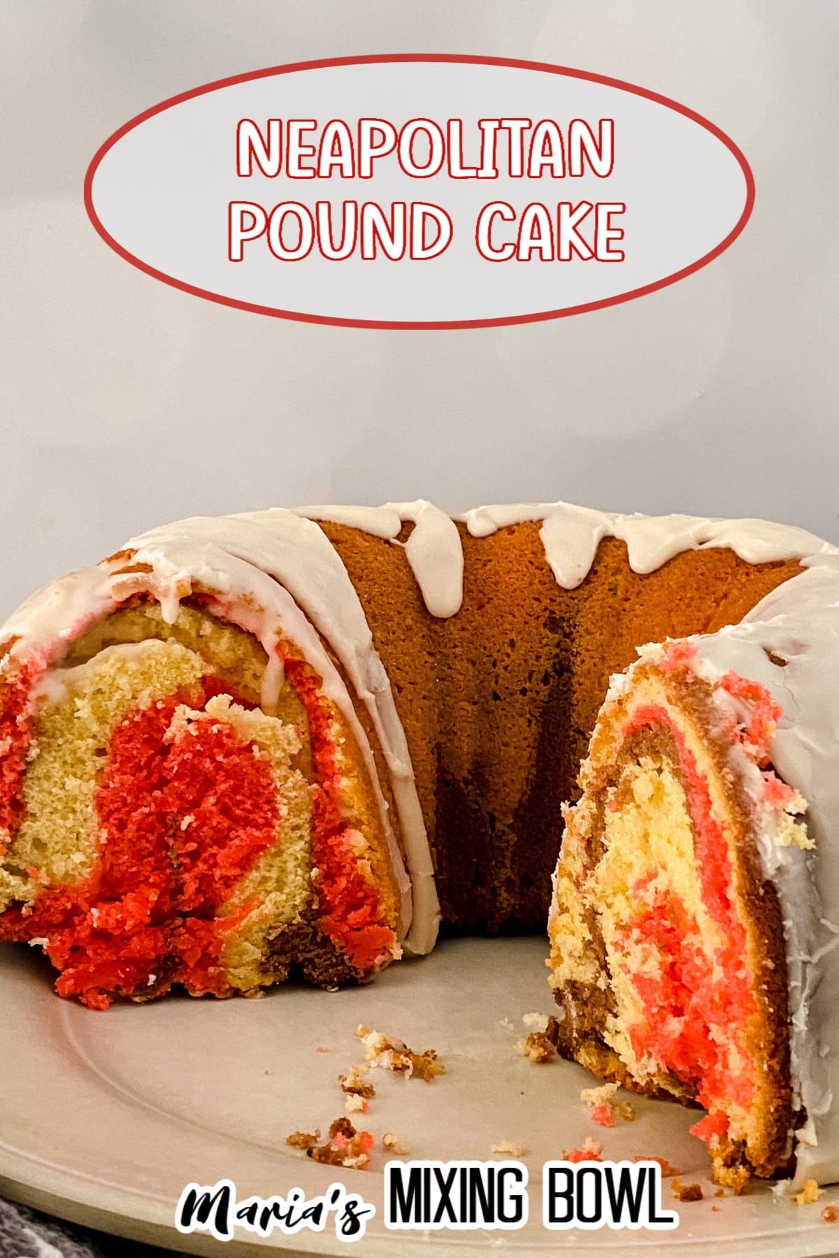 cut neapolitan pound cake on a white plate