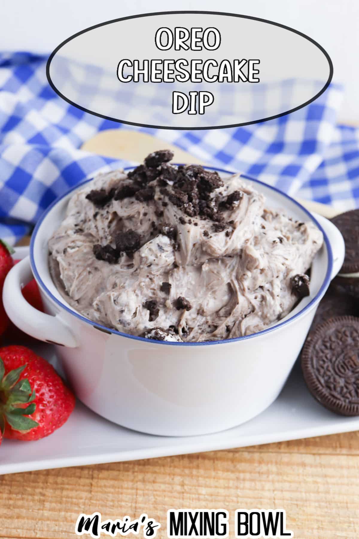 oreo cheesecake dip in a white bowl with the name text for pinterest