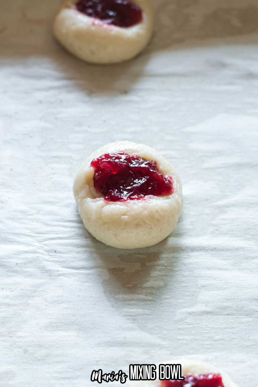 cookie dough ball filled with raspberry jelly