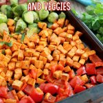 sausage, brussel sprouts, sweet potatoes and peppers on a sheet pan with the name in text for pinterst