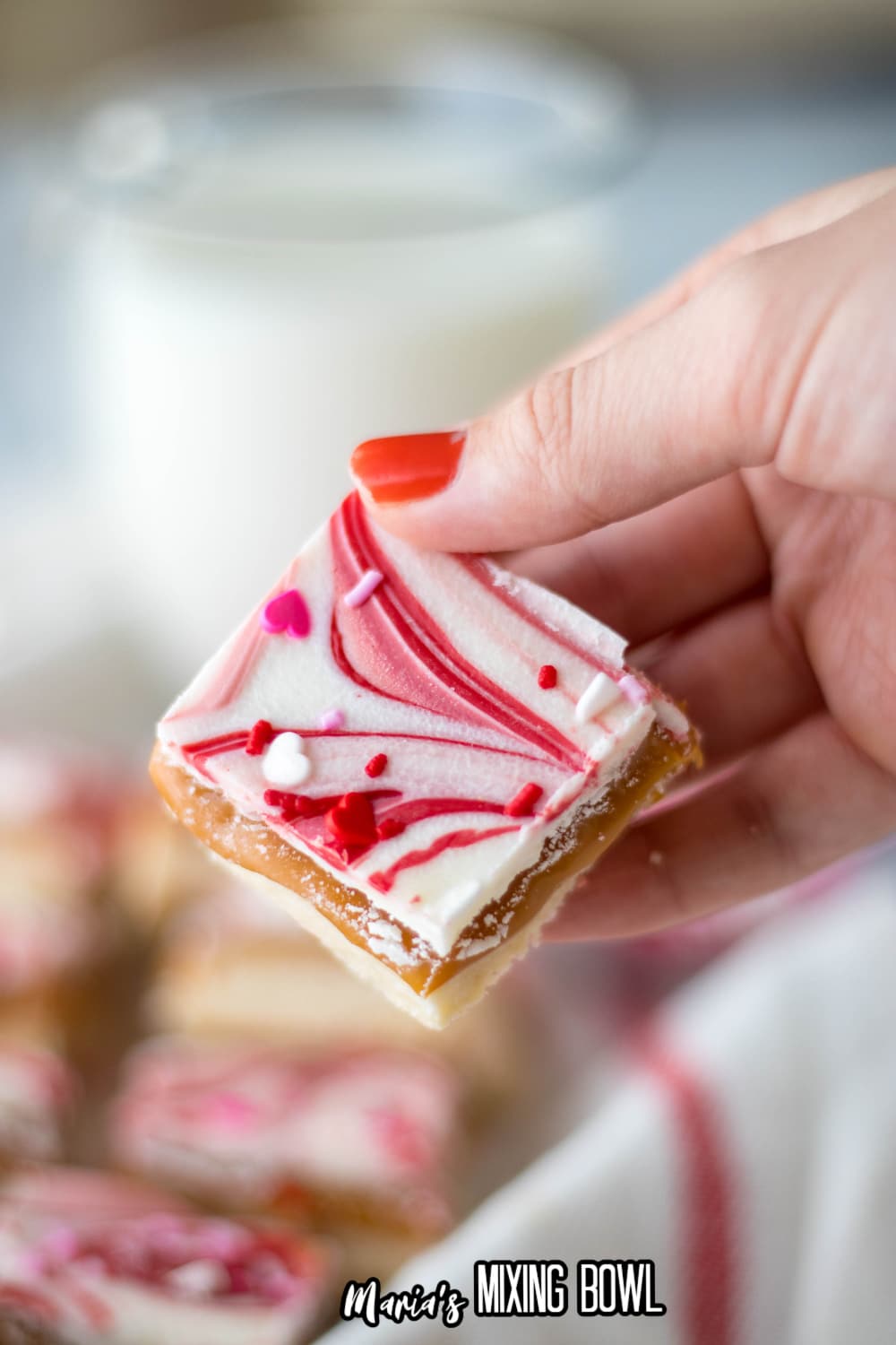 valentine millionaire bar held in a woman's hand