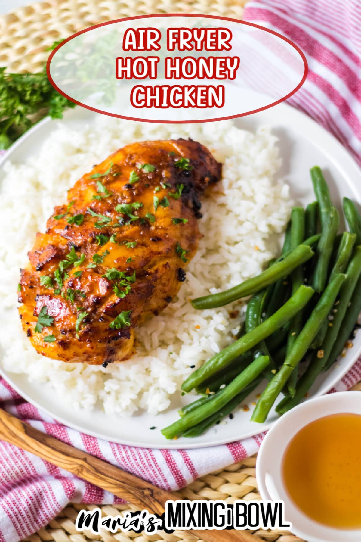 air fryer hot honey chicken breast on top of a bed of rice