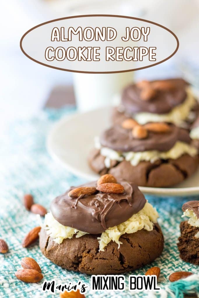almond joy cookies on a white plate and teal and white napkin