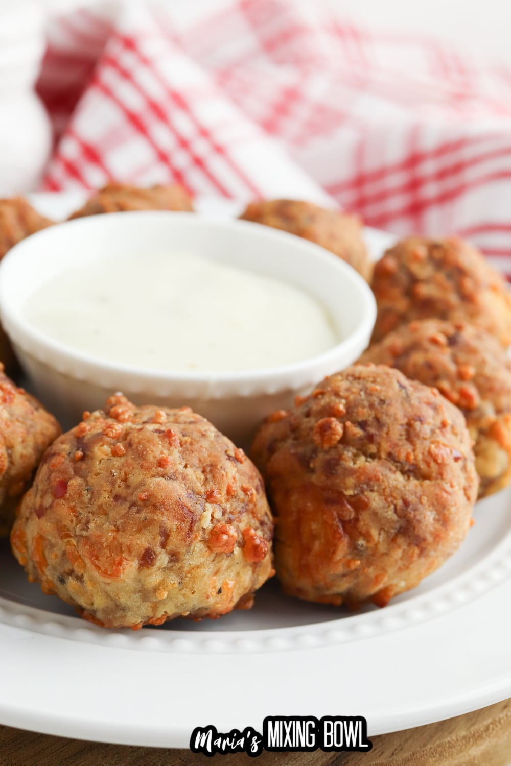 close up of bisquick sausage balls on a white plate